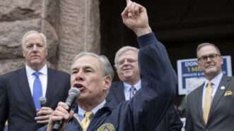 Greg Abbott speaks into a microphone |  Bob Daemmrich/Zuma Press/Newscom